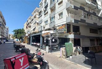  İzmir Bostanlı’da Satılık Çift Dükkan  Yüksek Tabela Değeri!