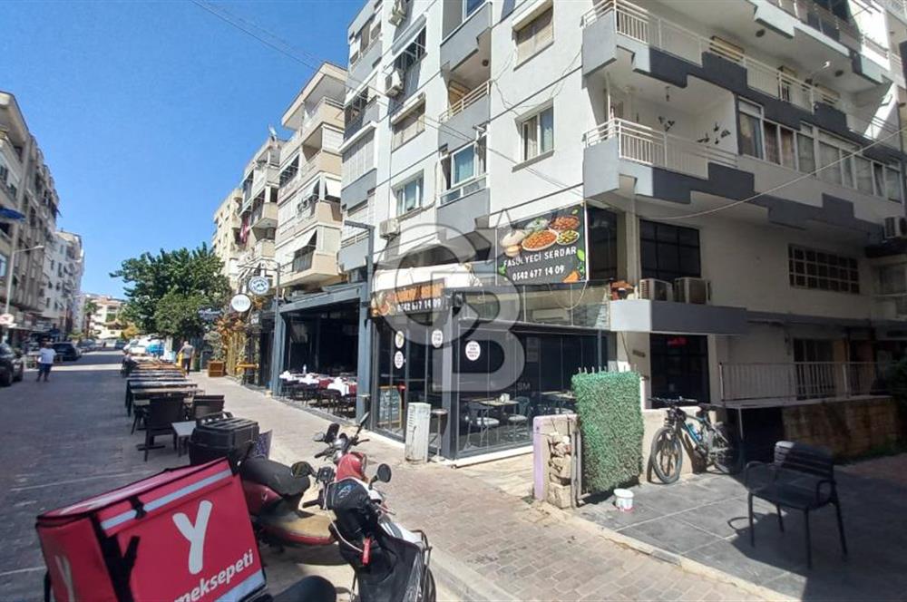  İzmir Bostanlı’da Satılık Çift Dükkan  Yüksek Tabela Değeri!