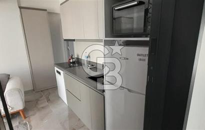 KARŞIYAKA ÇARŞI İÇİNDE SIFIR BİNA SIFIR EŞYALI 1+1 DAİRE