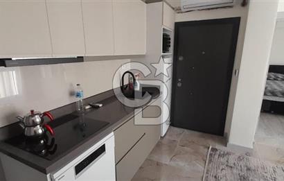 KARŞIYAKA ÇARŞI İÇİNDE SIFIR BİNA SIFIR EŞYALI 1+1 DAİRE