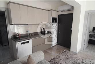 KARŞIYAKA ÇARŞI İÇİNDE SIFIR BİNA SIFIR EŞYALI 1+1 DAİRE
