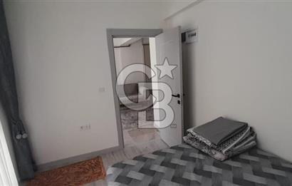 KARŞIYAKA ÇARŞI İÇİNDE SIFIR BİNA SIFIR EŞYALI 1+1 DAİRE
