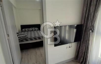 KARŞIYAKA ÇARŞI İÇİNDE SIFIR BİNA SIFIR EŞYALI 1+1 DAİRE