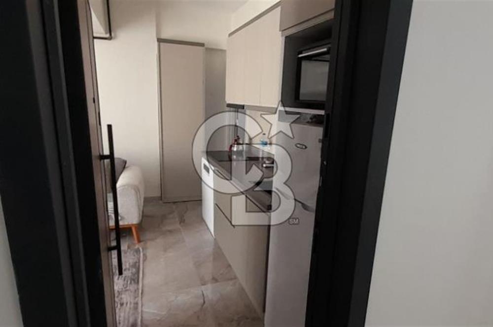 KARŞIYAKA ÇARŞI İÇİNDE SIFIR BİNA SIFIR EŞYALI 1+1 DAİRE