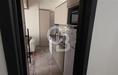 KARŞIYAKA ÇARŞI İÇİNDE SIFIR BİNA SIFIR EŞYALI 1+1 DAİRE