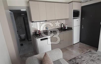 KARŞIYAKA ÇARŞI İÇİNDE SIFIR BİNA SIFIR EŞYALI 1+1 DAİRE