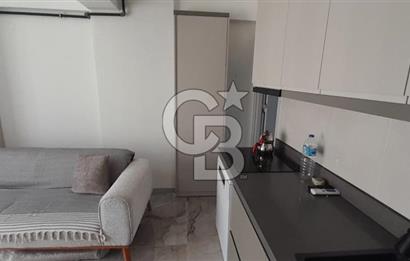 KARŞIYAKA ÇARŞI İÇİNDE SIFIR BİNA SIFIR EŞYALI 1+1 DAİRE
