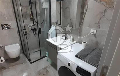 KARŞIYAKA ÇARŞI İÇİNDE SIFIR BİNA SIFIR EŞYALI 1+1 DAİRE