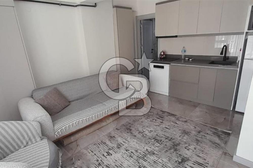KARŞIYAKA ÇARŞI İÇİNDE SIFIR BİNA SIFIR EŞYALI 1+1 DAİRE