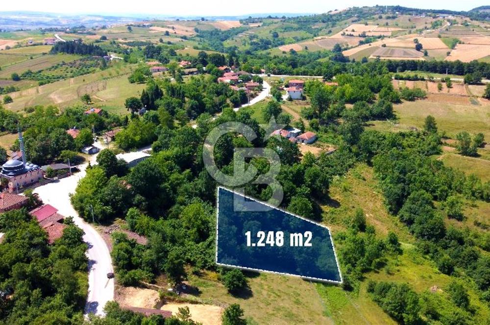 KANDIRA KAYMAZERİKLİ DE %40 KÖYİÇİ İMARLI YOL CEPHE 1248 m² ARSA
