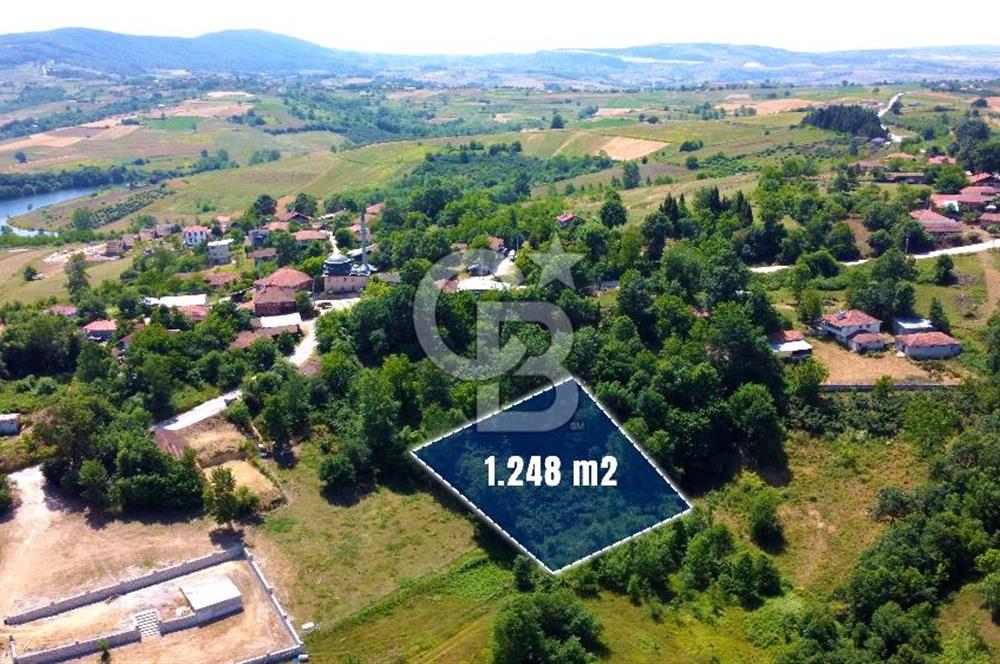 KANDIRA KAYMAZERİKLİ DE %40 KÖYİÇİ İMARLI YOL CEPHE 1248 m² ARSA