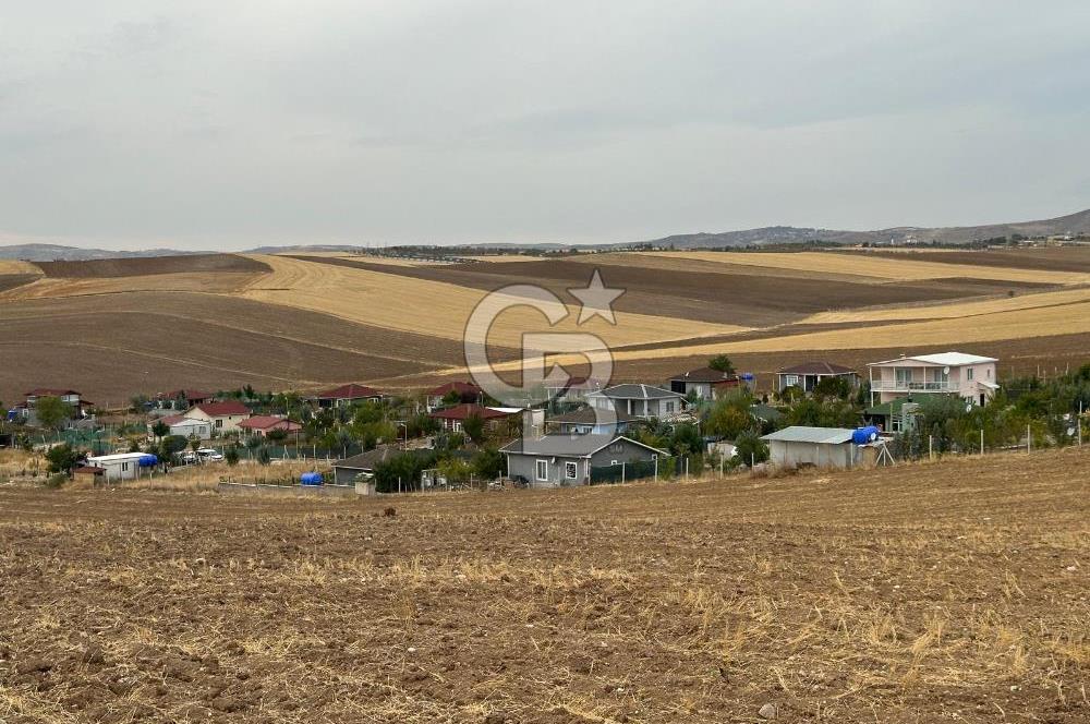ÇUBUK İKİPINARDA 6.050 M² TEL ÇEVRİLİ ELEKTRİK YOLU OLAN TARLA