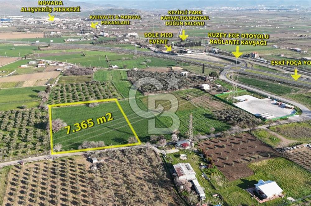 E.FOÇA YOLU ÜZERİ YOLA CEPHE SATILIK 7365 M2 TARLA