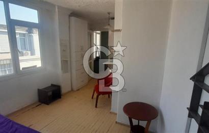 karşıyaka çarşı içinde 1+0 teraslı daire