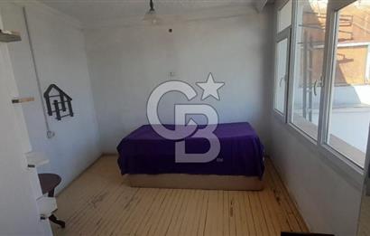 karşıyaka çarşı içinde 1+0 teraslı daire