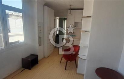 karşıyaka çarşı içinde 1+0 teraslı daire