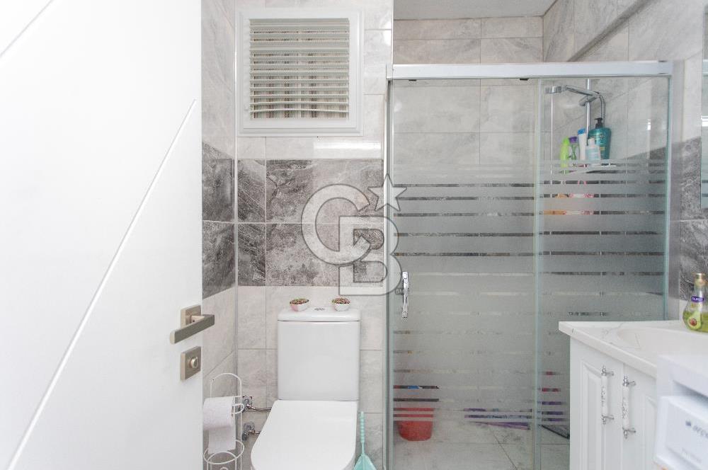 Foça Yenibağarası Mah. Satılık 2+1 Bahçe Katı Daire