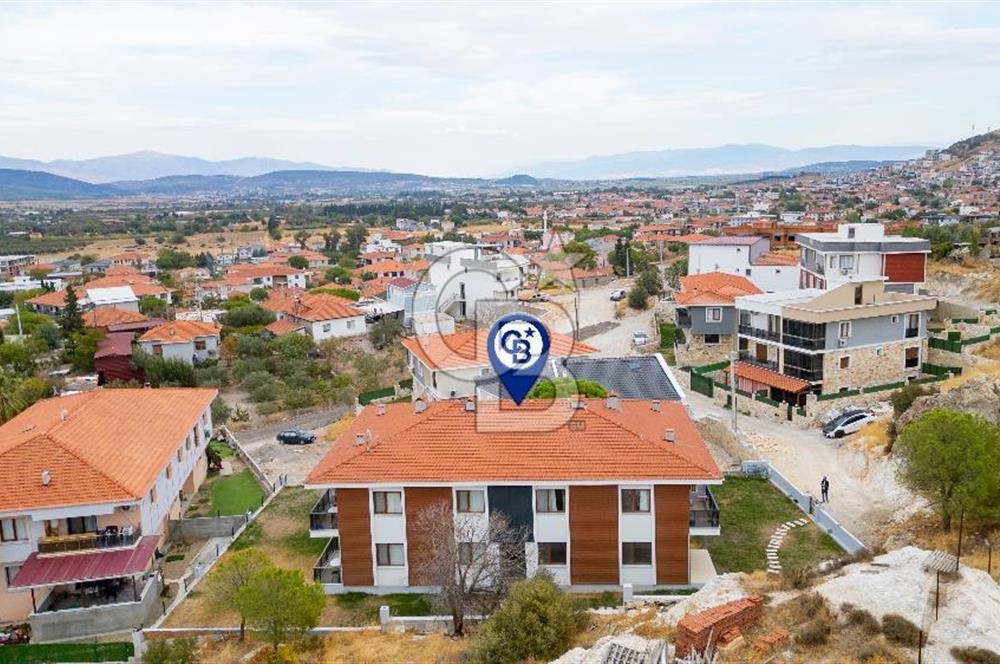 Foça Yenibağarası Mah. Satılık 2+1 Bahçe Katı Daire