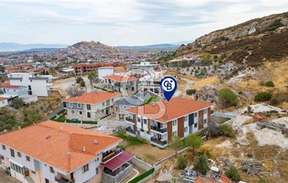 Foça Yenibağarası Mah. Satılık 2+1 Bahçe Katı Daire