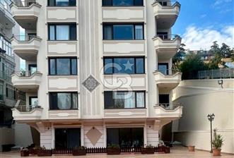 Sahil parselinde açık havuzlu ve kapalı garajlı binada 4+1daire