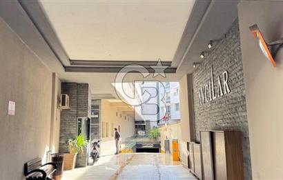 bayraklı'da satılık cadde üzeri dükkan