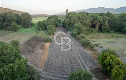 CB MARİNA'DAN ULA KIZILYAKA'DA 2.500M2 TİCARİ TARLA