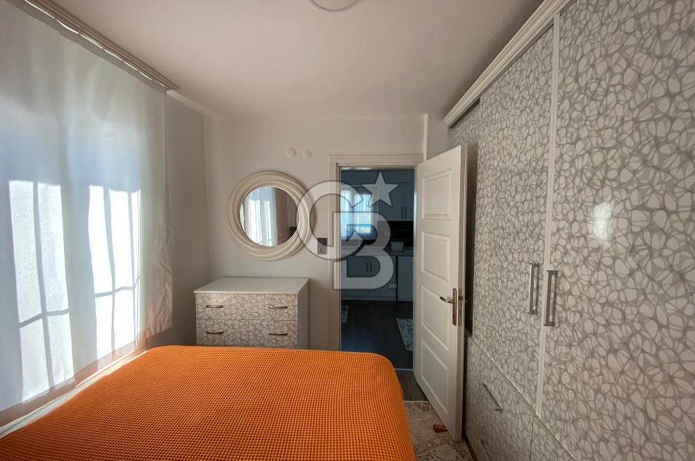 AKBÜK MERKEZDE,DENİZE 3 ADIM MESAFEDE EŞYALI 2+1 DAİRE -YAZ/KIŞ  YAŞANACAK KONUMDA!