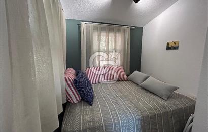 Palamutbükü Mertur Sitesi’nde Denize Yakın Yenilenmiş 2+1 Bahçe Katı Daire