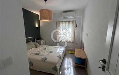 Palamutbükü Mertur Sitesi’nde Denize Yakın Yenilenmiş 2+1 Bahçe Katı Daire
