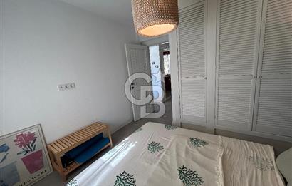 Palamutbükü Mertur Sitesi’nde Denize Yakın Yenilenmiş 2+1 Bahçe Katı Daire