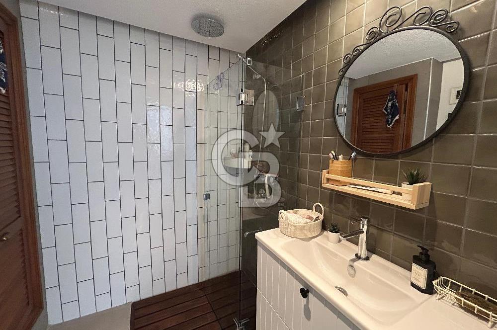 Palamutbükü Mertur Sitesi’nde Denize Yakın Yenilenmiş 2+1 Bahçe Katı Daire