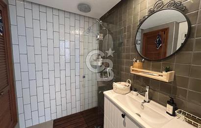 Palamutbükü Mertur Sitesi’nde Denize Yakın Yenilenmiş 2+1 Bahçe Katı Daire