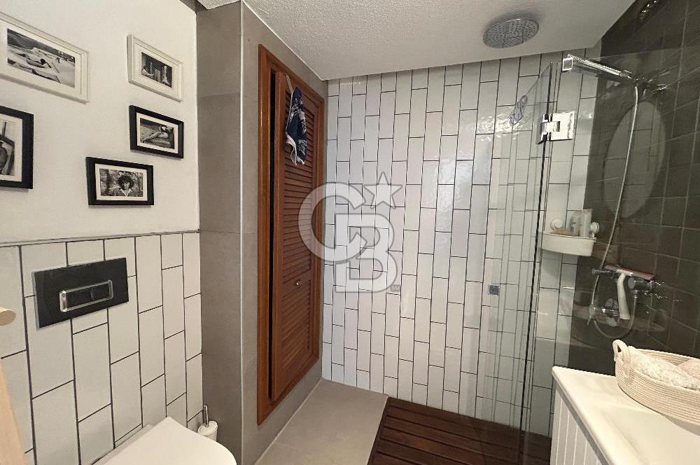 Palamutbükü Mertur Sitesi’nde Denize Yakın Yenilenmiş 2+1 Bahçe Katı Daire