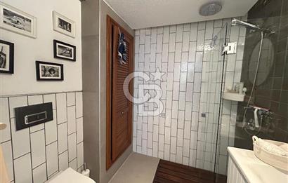 Palamutbükü Mertur Sitesi’nde Denize Yakın Yenilenmiş 2+1 Bahçe Katı Daire