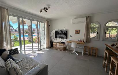 Palamutbükü Mertur Sitesi’nde Denize Yakın Yenilenmiş 2+1 Bahçe Katı Daire