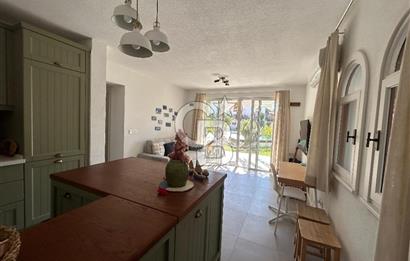 Palamutbükü Mertur Sitesi’nde Denize Yakın Yenilenmiş 2+1 Bahçe Katı Daire