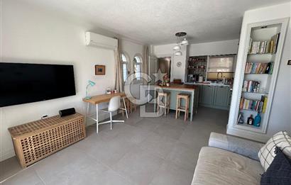 Palamutbükü Mertur Sitesi’nde Denize Yakın Yenilenmiş 2+1 Bahçe Katı Daire