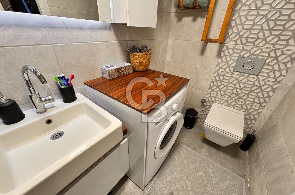İzmir Çandarlı Arcava Homes Sitesi 2+1 Bahçe Katı Satılık Daire