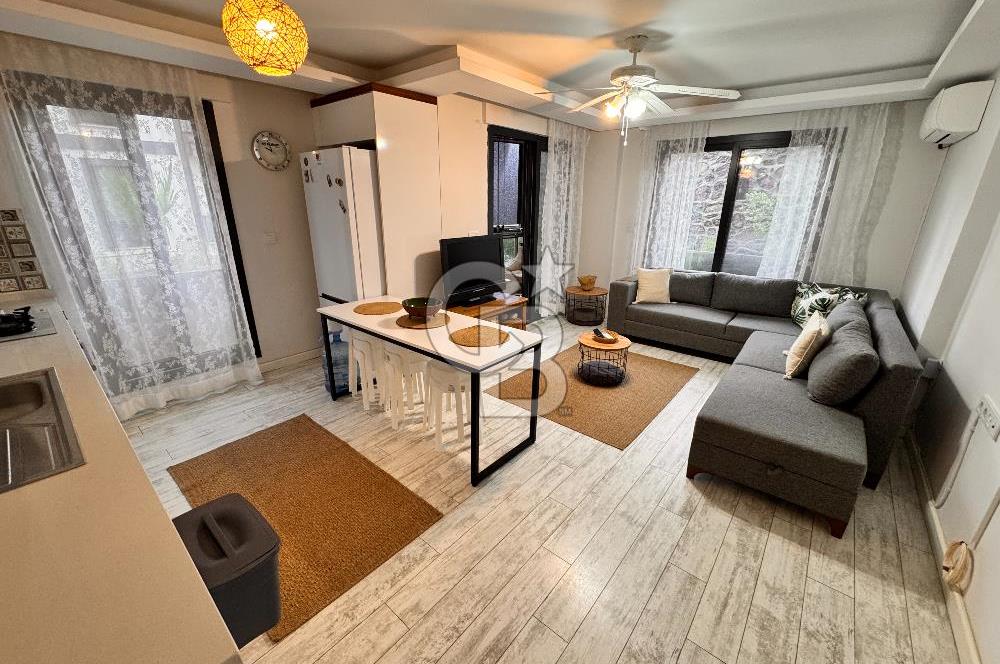 İzmir Çandarlı Arcava Homes Sitesi 2+1 Bahçe Katı Satılık Daire