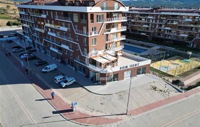 ÇANAKKALE KEPEZ KORUKENT SİTESİNDE CADDE ÜZERİ SATILIK DÜKKAN 