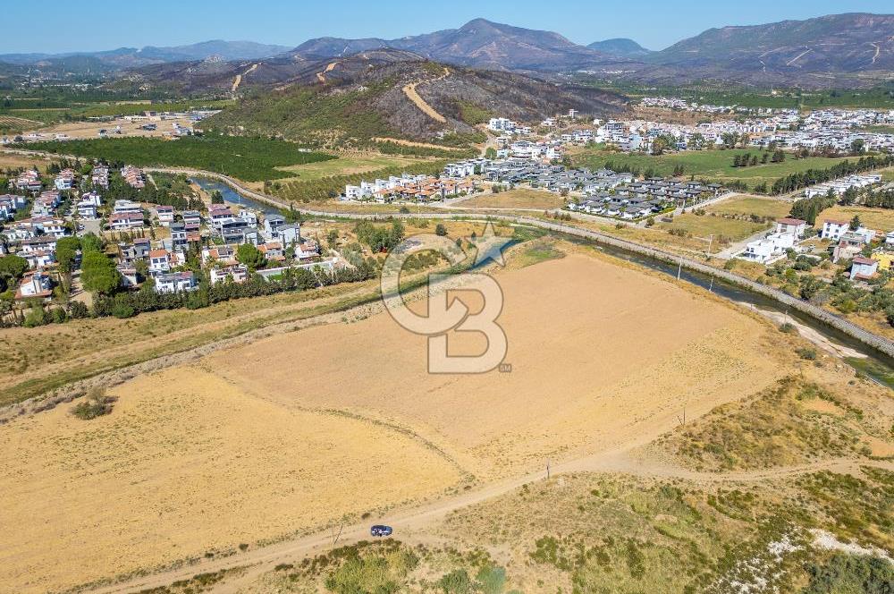 SEFERİHİSAR DOĞANBEY TURİZM İMARLI 8.670 M2 ARSA