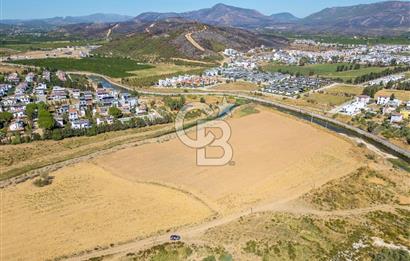 SEFERİHİSAR DOĞANBEY TURİZM İMARLI 8.670 M2 ARSA