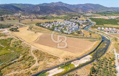 SEFERİHİSAR DOĞANBEY TURİZM İMARLI 8.670 M2 ARSA