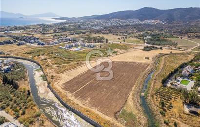 SEFERİHİSAR DOĞANBEY TURİZM İMARLI 8.670 M2 ARSA