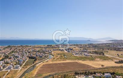 SEFERİHİSAR DOĞANBEY TURİZM İMARLI 8.670 M2 ARSA