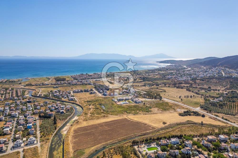 SEFERİHİSAR DOĞANBEY TURİZM İMARLI 8.670 M2 ARSA
