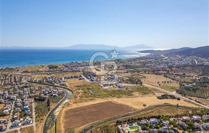 SEFERİHİSAR DOĞANBEY TURİZM İMARLI 8.670 M2 ARSA