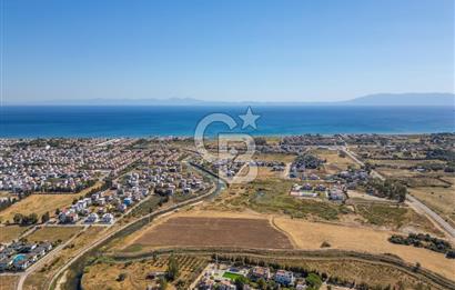 SEFERİHİSAR DOĞANBEY TURİZM İMARLI 8.670 M2 ARSA