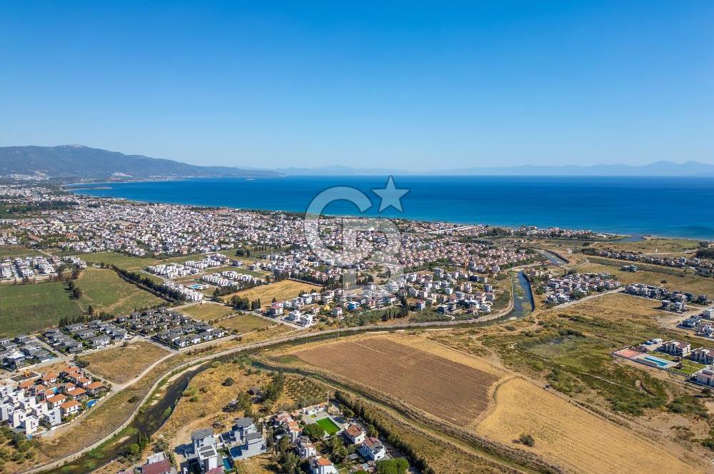 SEFERİHİSAR DOĞANBEY TURİZM İMARLI 8.670 M2 ARSA