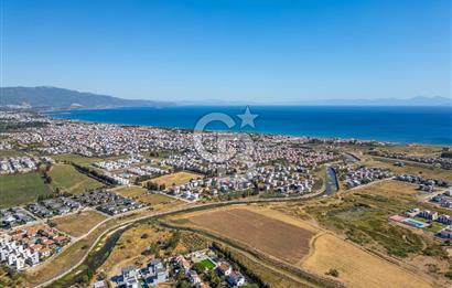 SEFERİHİSAR DOĞANBEY TURİZM İMARLI 8.670 M2 ARSA